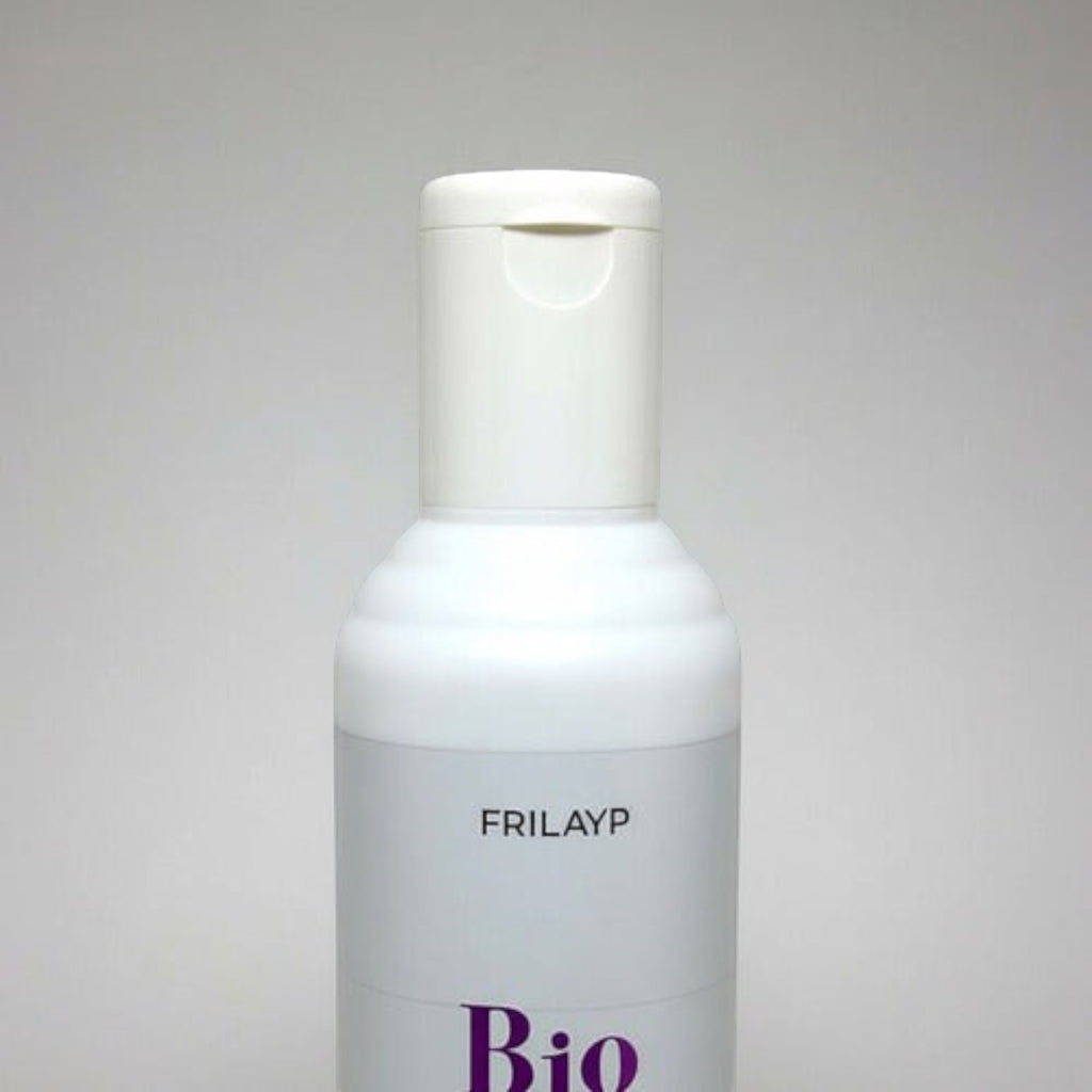 Acondicionador Frilayp Biotina y Colágeno de Distriwil en envase blanco de 370ml para fortalecer el cabello.