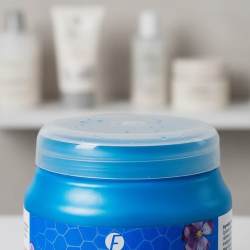 Pote azul de baño capilar Frilayp con lino y ácido hialurónico de Distriwil para hidratación profunda del cabello