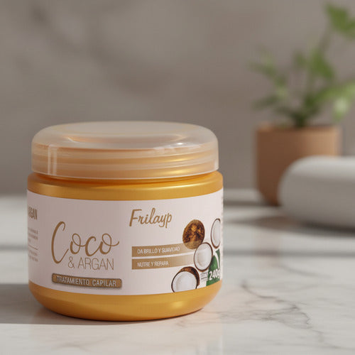Tarro de baño de crema Frilayp Coco y Argan de Distriwil sobre superficie de mármol con planta de fondo
