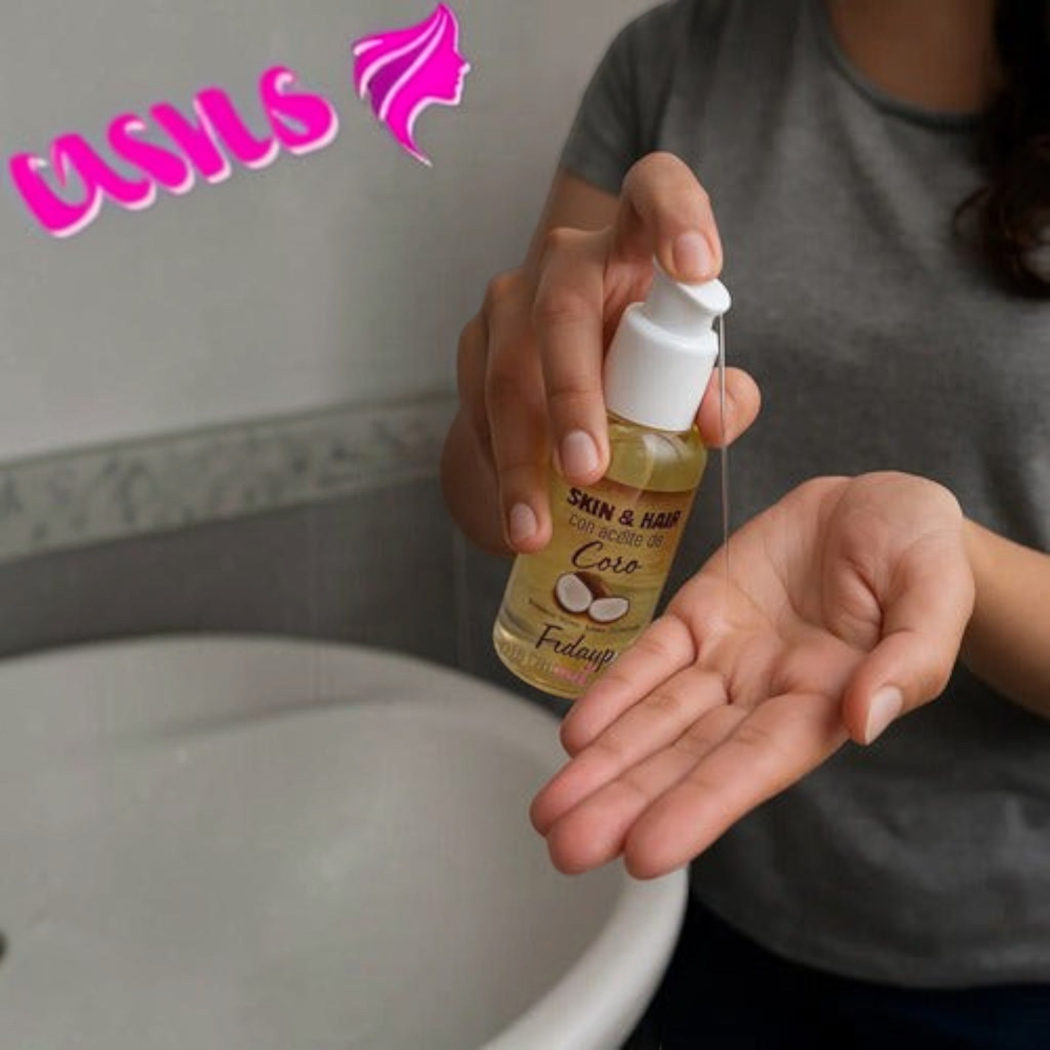 Distriwil Booster Aceite de Coco Frilayp en frasco dosificador siendo aplicado en la palma de la mano