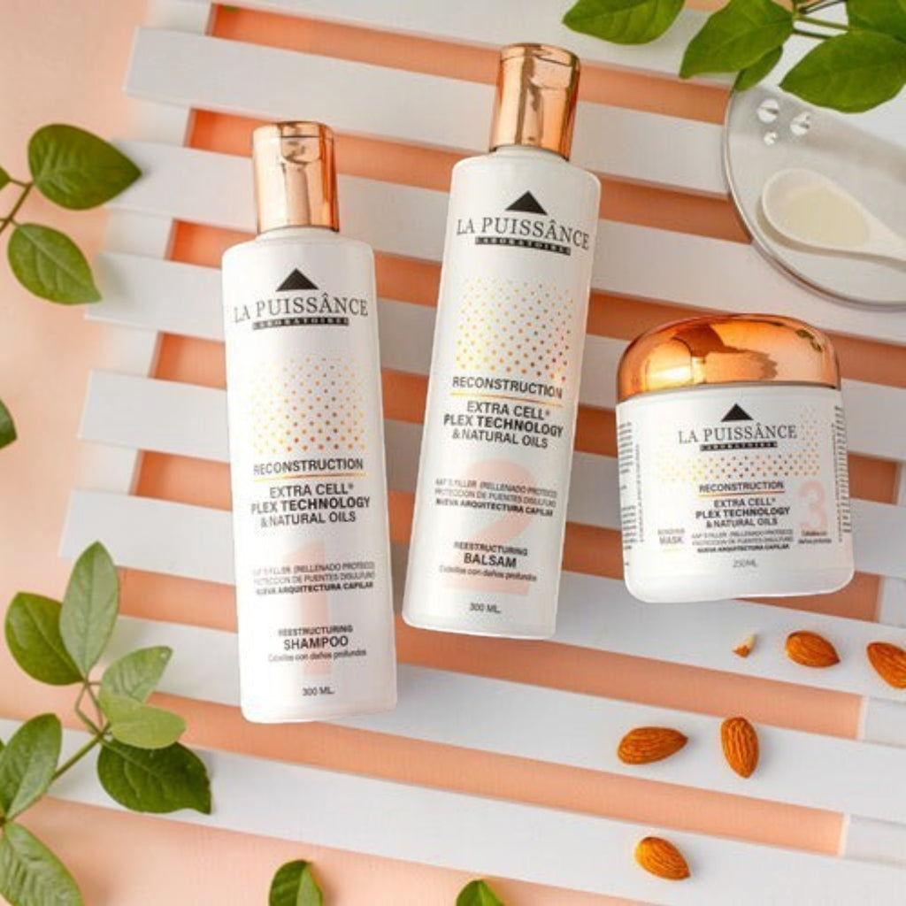 Kit Distriwil La Puissance Extra Cell con shampoo, bálsamo y máscara reparadora para cabello dañado sobre fondo claro.