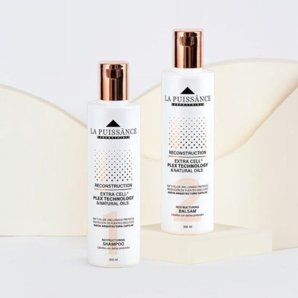 Kit Distriwil La Puissance Extra Cell con shampoo y acondicionador reparadores para cabello dañado en envases blancos.