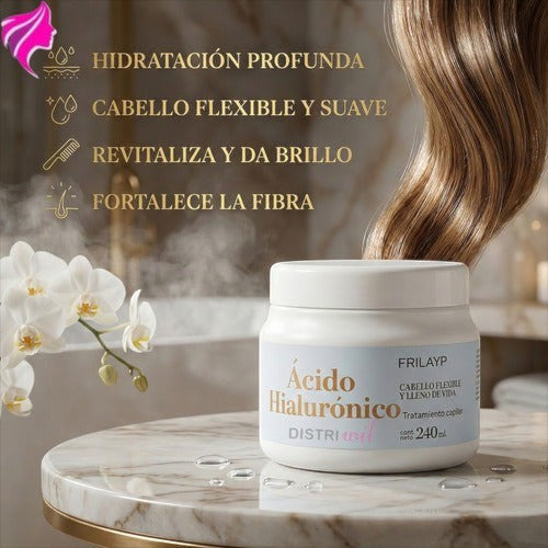 Kit de tratamiento capilar Distriwil con máscara de ácido hialurónico Frilayp sobre mesa de mármol con flores blancas