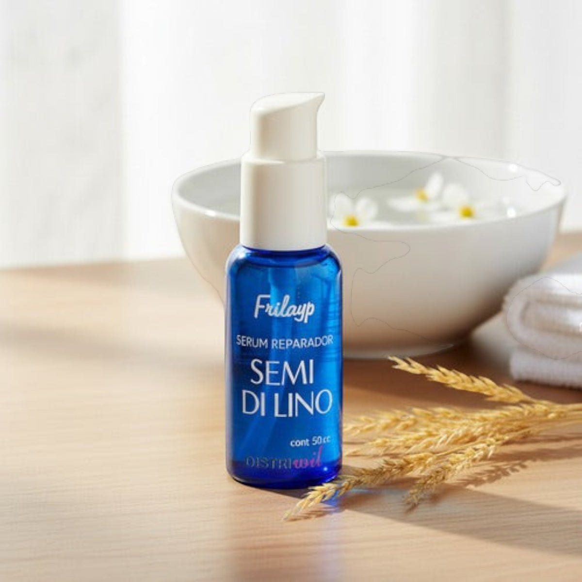 Serum reparador Distriwil Semi Di Lino en frasco azul con dosificador, ideal para reparar puntas dañadas del cabello.